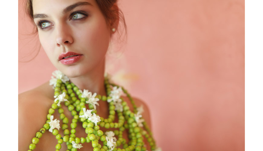 Alina Pizzano ball gown and an alternative bridal necklace made from green hypericum berries and white tuberoses by tic  tock Couture Florals, hair and makeup by Erin Skipley, photos by Apertura Photography taken at The Grand Del Mar Resort in San Diego, California
